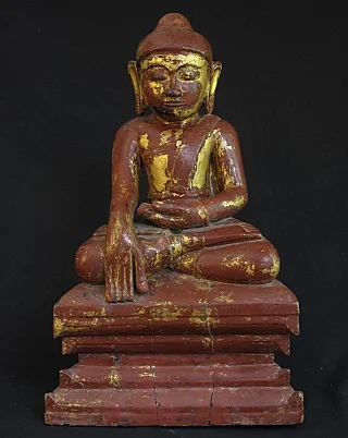 Antique sitting Buddha