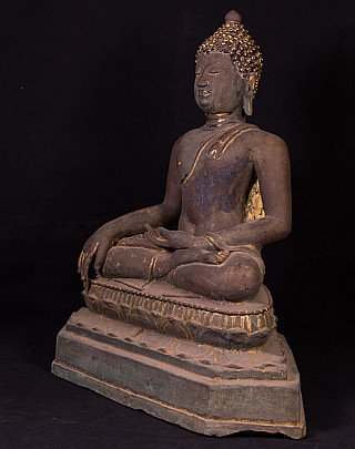 Thai bronze Buddha statue seated, three-quarter left view with traces of gilding