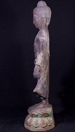 Standing Burmese bronze Buddha statue, left side profile view