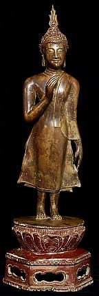 Sukhothai Buddha statue in bronze from Thailand, walking standing pose, full front view