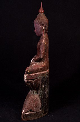 Wooden Buddha statue from Burma, left side profile with tall back support and pointed ushnisha