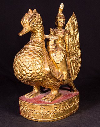 Antiker hölzerner Hintha-Vogel aus Burma (Myanmar) mit Reiterfigur, Dreiviertelansicht links