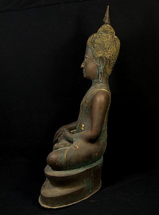 Thai bronze Buddha statue seated, left side profile showing elongated ear and base