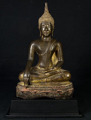 Thai bronze Buddha statue, seated in bhumisparsha mudra, full front view on base