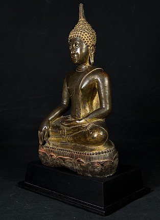 Bronze Buddha statue from Thailand, seated in bhumisparsha mudra, three-quarter left view