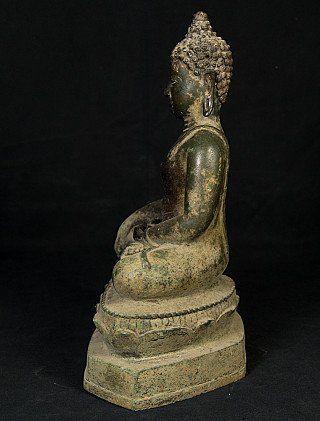 Bronzen Boeddha uit Thailand, linker zijaanzicht met krulhaar en lang oor