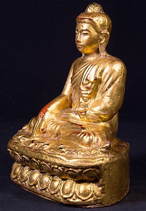 Old wooden Buddha statue