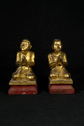 Wooden monk statues from Burma (Myanmar) in namaskara mudra, front view of the pair