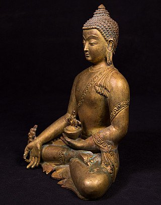 Medizin-Buddha-Statue aus Nepal in Bronze, sitzend in Dreiviertelansicht mit Schale