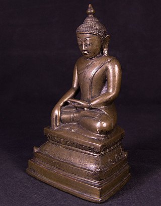 Bronze Ava Buddha statue from Burma (Myanmar), three-quarter view showing bhumisparsha hand gesture
