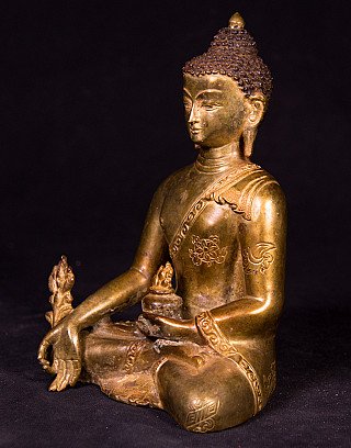 Medizin-Buddha-Statue aus Nepal in Bronze, Dreiviertelansicht, mit Schale und herabhängender rechter Hand