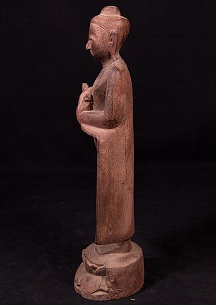 Old wooden Buddha statue