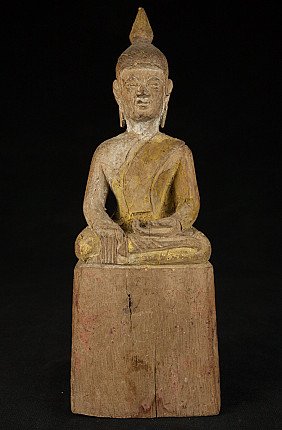 Thai wooden Buddha statue seated on tall base, full front view with bhumisparsha mudra