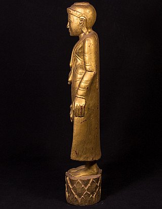 Standing wooden Buddha statue from Burma (Myanmar), left side profile