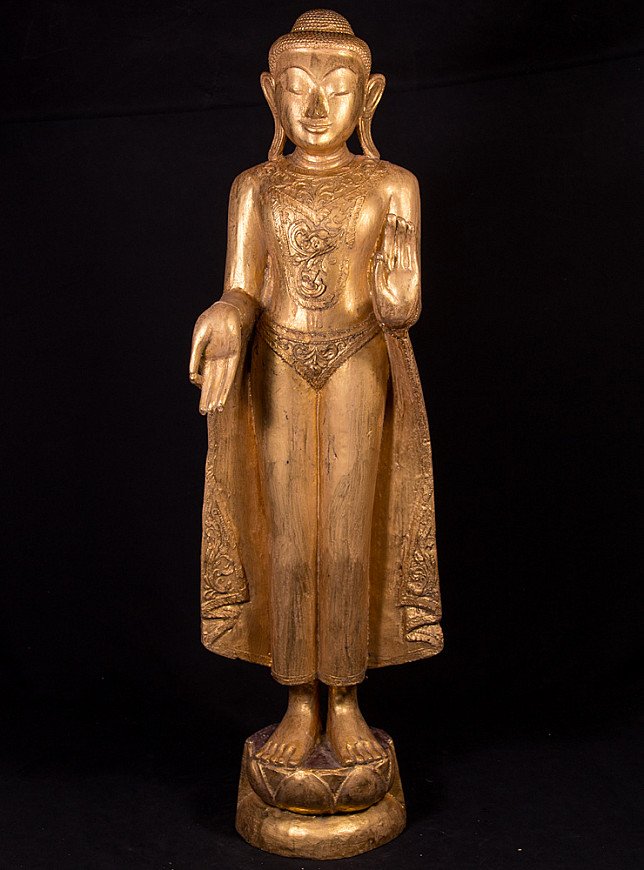 Old wooden Burmese Buddha statue