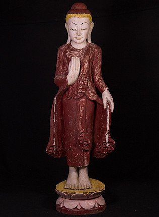 Stehende Buddha-Statue aus Holz aus Burma (Myanmar) auf Lotussockel, Vorderansicht mit erhobener rechter Hand