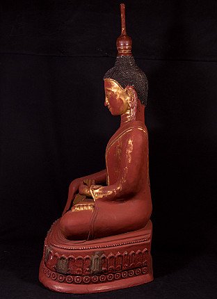 Burmese lacquerware Buddha statue on a high base, left side profile view