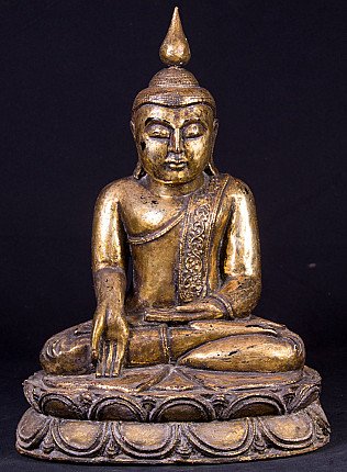 Wooden Buddha statue from Burma (Myanmar) on lotus base, full-front view with Varada mudra