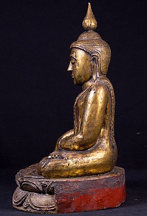 Wooden Buddha statue from Burma (Myanmar), left side profile view