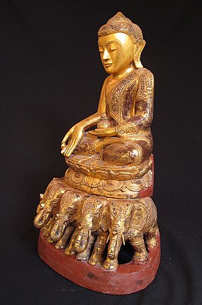 Buddha statue from Burma (Myanmar) on elephant throne, three-quarter left view