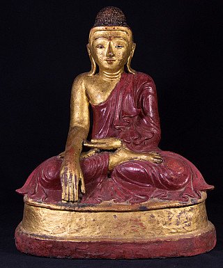 Burmese Buddha statue in lacquerware, seated in bhumisparsha mudra, full front with red robe and gilding