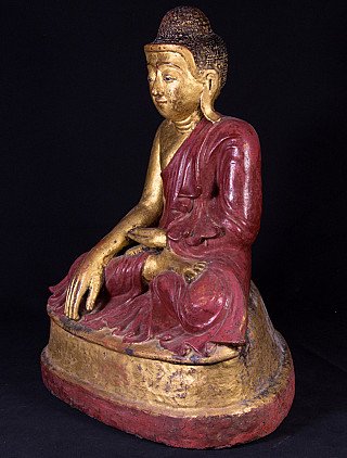Buddha statue from Burma (Myanmar) in lacquerware, three-quarter view showing gilded face and red robe