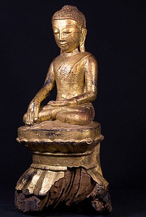 Ava period Burmese wooden Buddha statue in bhumisparsha mudra, three-quarter view
