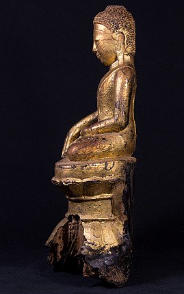 Burmese wooden Buddha statue seated, left side profile