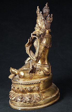 Nepalesische Bronze-Statue der Grünen Tara, linke Seitenansicht mit Sockelprofil und Armhaltung