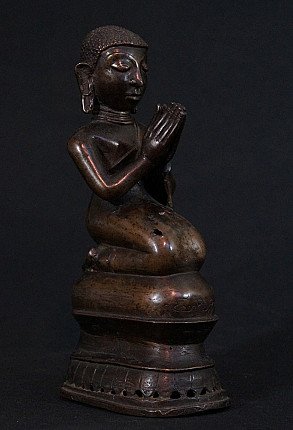 Antique Burmese bronze monk statue in Namaskara mudra, three-quarter left view