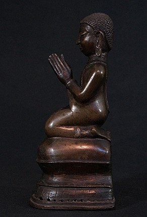 Shan-style Burmese bronze monk statue, right side profile in prayer gesture