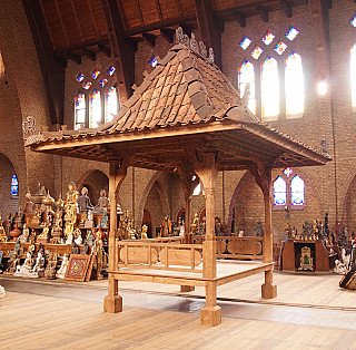 Indonesian teak temple house, three-quarter left view with open railing