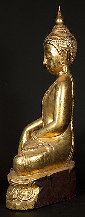 Oude teakhouten Boeddha