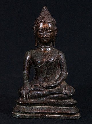 Thai bronze Buddha statue seated in bhumisparsha mudra, full front view on stepped base