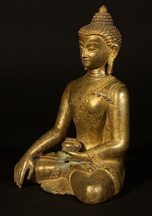 Old copper Buddha statue