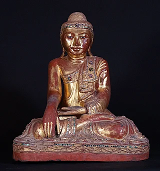 Burmese Mandalay Buddha statue in wood, seated in bhumisparsha mudra, full front view