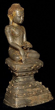 Bronze Buddha statue from Burma (Myanmar), three-quarter left view showing the tiered base