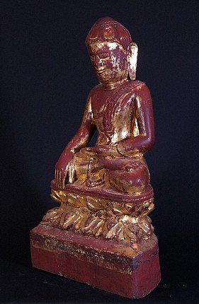 Buddha statue from Myanmar in Shan style, three-quarter left view with red lacquer and worn gilding