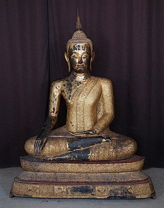 Thai bronze Buddha statue seated in Bhumisparsha mudra, full front view on decorated base