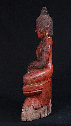 Seated wooden Buddha statue from Burma, left side profile