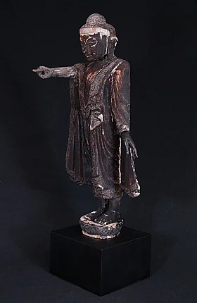 Antique standing Mandalay Buddha statue