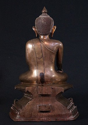 Burmese bronze Buddha statue, rear view showing robe lines and back of base