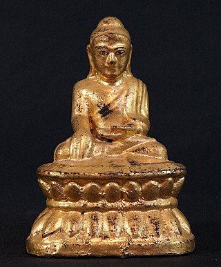 Antique wooden Buddha statue from Burma, seated on lotus base, full-front view