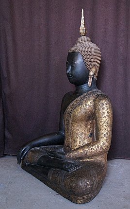 Thai bronze Buddha statue with gilded robe, three-quarter left view