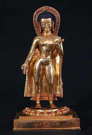 Bronze Buddha statue from Nepal standing on an ornate base with halo, full front view