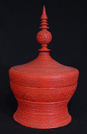 Antique Burmese wooden offering vessel with red lacquer finish, full view with finial