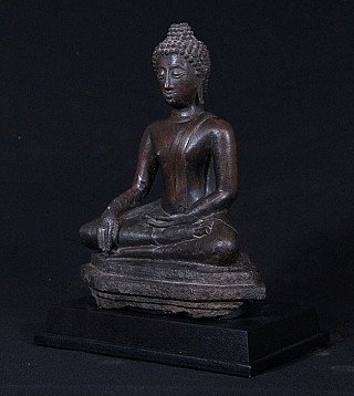 Thai bronze Buddha statue seated, three-quarter left view showing base and legs