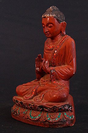Oude houten Boeddha