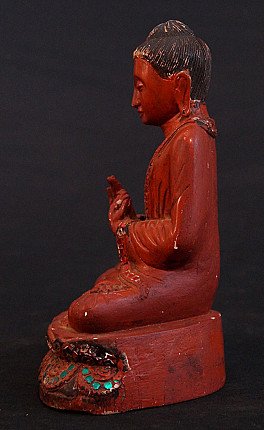 Oude houten Boeddha