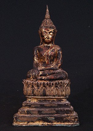 Thai bronze Buddha statue seated in bhumisparsha mudra, full front view on tiered base